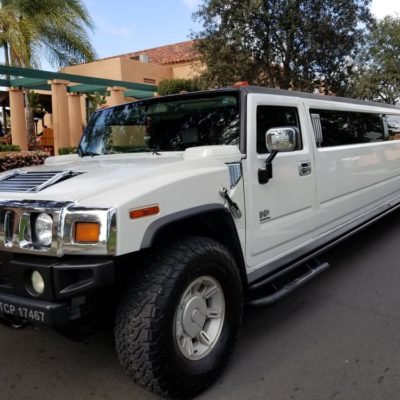 Hummer Limo Rental Near Me with White Stretch for 20 passengers.