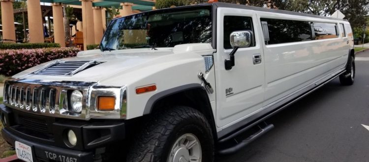 Hummer Limo Rental Near Me with White Stretch for 20 passengers.