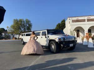 City Captain White Hummer Limo with picture of a mexican girl on Quinceanera