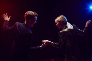 young-couple-dancing-at-party-san-diego-prom-limousine-service-with-city-captain-scaled