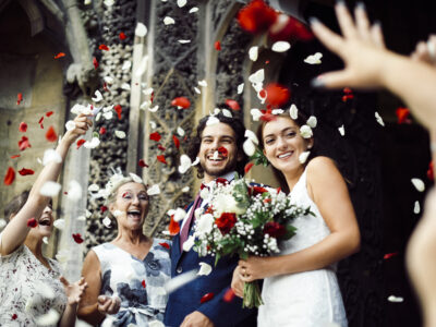 Family throwing rose petals at the newly wed bride and groom in La Jolla, San Diego, Carlsbad Wedding.