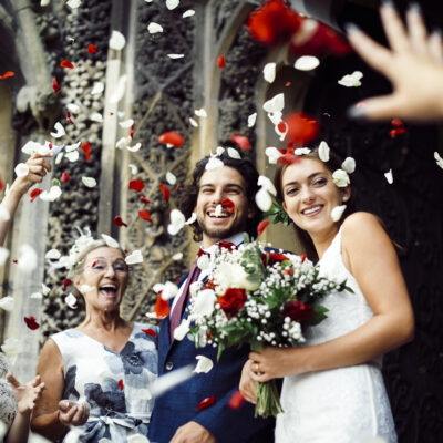 Family throwing rose petals at the newly wed bride and groom in La Jolla, San Diego, Carlsbad Wedding.