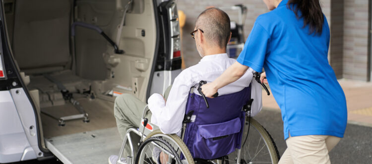 A caregiver who puts an elderly person in wheelchair accessible van in San Diego, ca for doctors appointments...